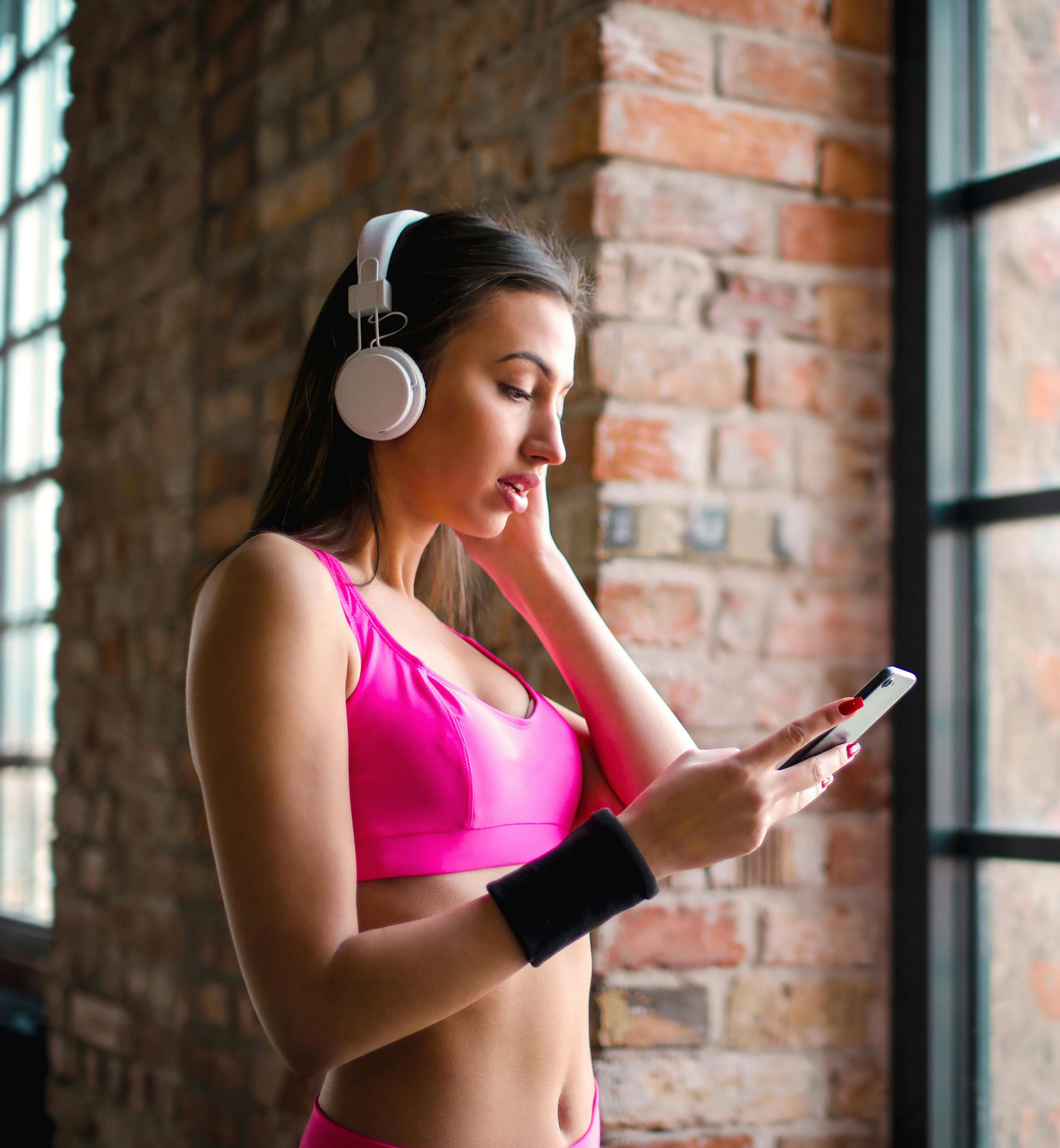 group of women exercise using dumbbells